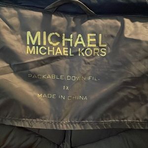 Slightly worn Michael kors packable coat size 1x